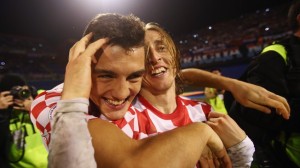 Luka Modric (R) of Croatia celebrates with team mate Mateo Kovacic